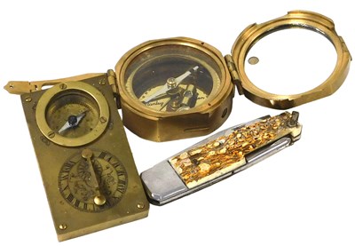 Lot 371 - A Stanley brass cased compass, a further brass...