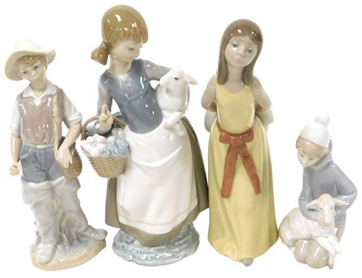 Lot 374 - Four Lladro porcelain figures, comprising a...