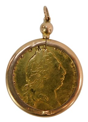 Lot 11 - A George III gold spade guinea, 1794, later...