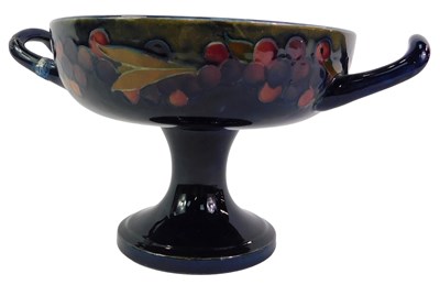 Lot 71 - A Moorcroft pottery Pomegranate pattern twin...