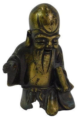 Lot 83 - A Chinese brass figure modelled as a Sage, in...