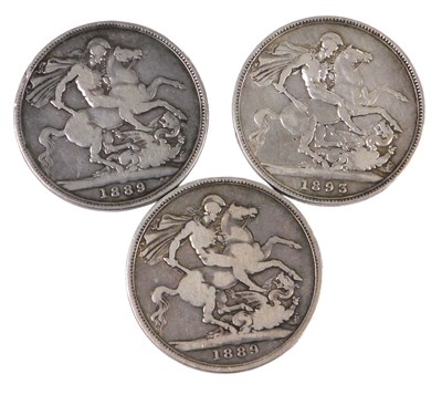 Lot 557 - Two Queen Victoria silver crowns 1889, and a...