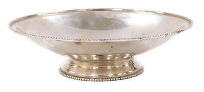 Lot 104 - A George V silver fluted sweet meat dish, with...