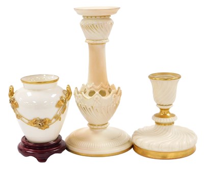 Lot 488 - A Royal Worcester blush porcelain candlestick,...