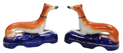 Lot 489 - A pair of early 20thC Staffordshire Greyhound...