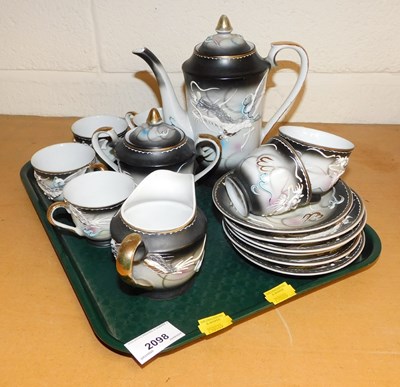 Lot 2098 - An Oriental porcelain part coffee service,...