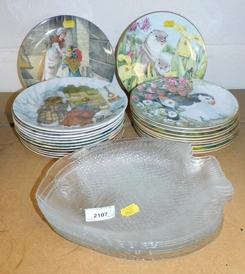 Lot 2107 - A set of six moulded glass fish shaped dishes,...