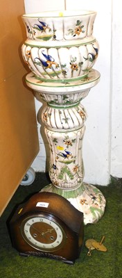 Lot 2023 - A early 20thC oak cased mantel clock, bearing...