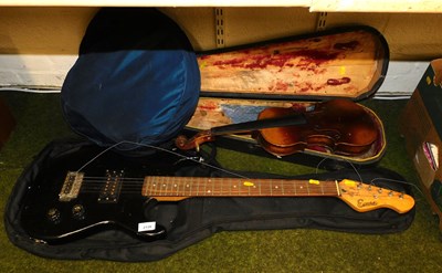 Lot 2128 - An Encore electric guitar, in black, with...