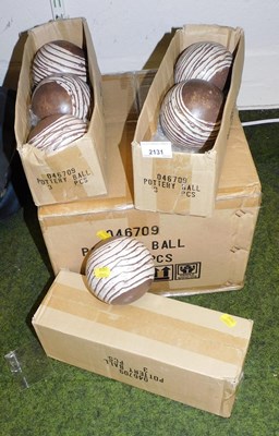 Lot 2131 - A quantity of pottery carpet balls.