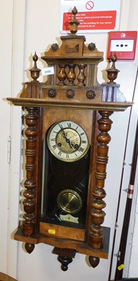 Lot 2086 - A walnut cased Vienna wall clock, the circular...