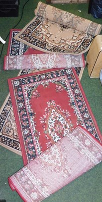 Lot 2211 - Four machine woven rugs.