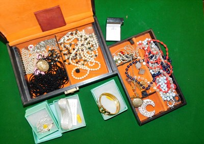 Lot 2217 - Costume jewellery, to include a bangle, beaded...
