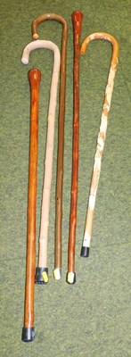 Lot 2160 - Various wooden walking sticks.
