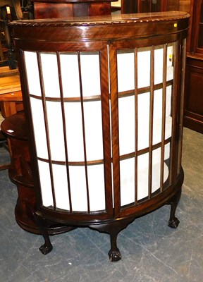 Lot 1058 - A mahogany demi lune display cabinet, the top...