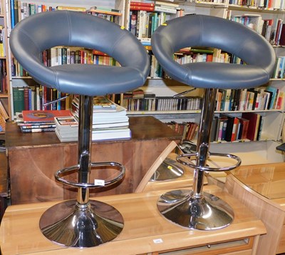 Lot 1075 - A pair of grey leatherette upholstered bar...