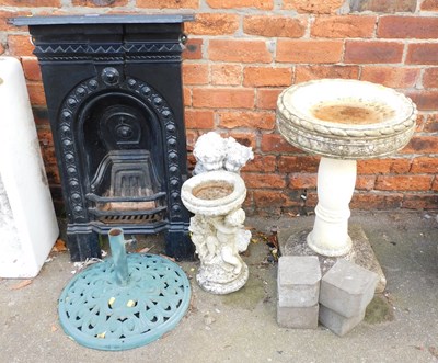 Lot 1089 - A black painted cast metal fire insert, 92cm...