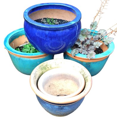 Lot 644 - A group of garden plant pots, to include two...