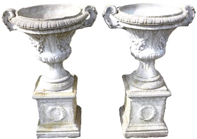 Lot 650 - A pair of composition stone campana style twin...