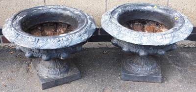 Lot 651 - A pair of black painted cast metal garden...