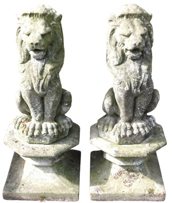 Lot 652 - A pair of stone garden statues, each modelled...