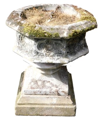 Lot 656 - A stone garden font or planter, with an...