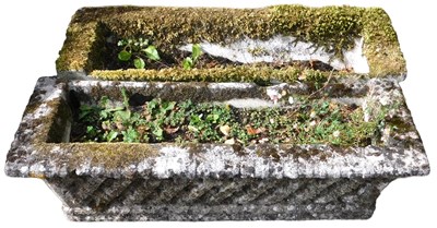 Lot 658 - A pair of rectangular garden planters, each of...