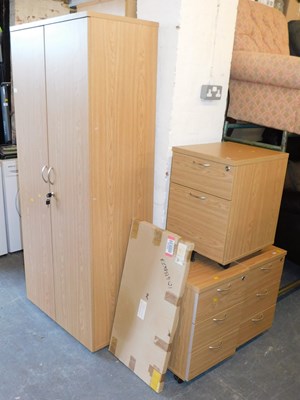 Lot 1018 - An oak veneer two-door office cabinet,...