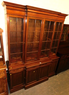 Lot 1023 - A 20thC mahogany break front display cabinet,...