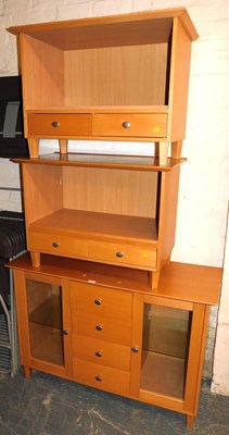 Lot 1031 - A 20thC side cabinet, with four central...