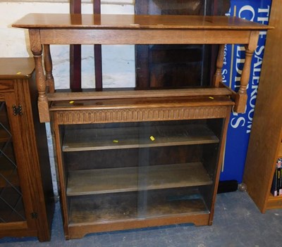 Lot 1034 - An oak bed frame, together with an oak coffee...