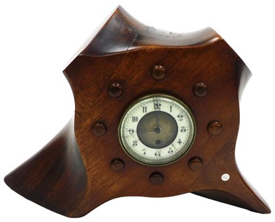 Lot 724 - A propeller mantel clock, the white enamel...