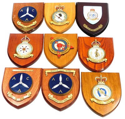 Lot 733 - Nine RAF wall plaques, to include Group Head...