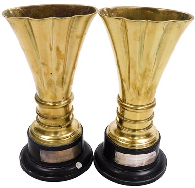 Lot 755 - Two brass shell case fluted and moulded...