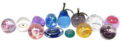 Lot 674 - Thirteen 20thC glass paperweights, swirl,...