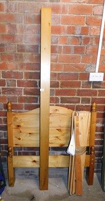 Lot 1129 - A pine single bed, comprising headboard,...