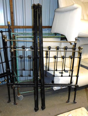 Lot 1131 - A Victorian cast metal and brass small double...