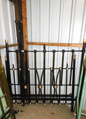 Lot 1132 - A Victorian black painted cast metal and brass...