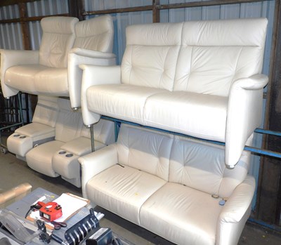 Lot 1134 - A cream leather sofa suite, comprising three...