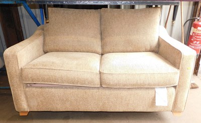 Lot 1136 - A 20thC pale brown upholstered two seater sofa...