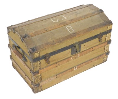Lot 773 - A dome top canvas wood and metalwork travel...