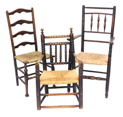 Lot 781 - Three early 19thC rush seated chairs.