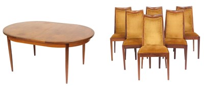 Lot 783 - A G-Plan teak dining suite, comprising an oval...