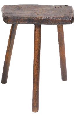Lot 786 - An 18thC rustic three legged stool.
