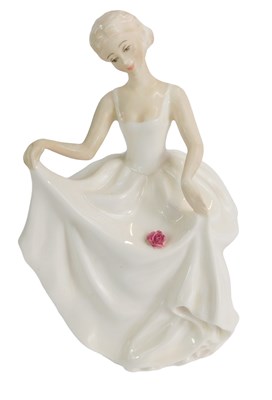Lot 208 - A Royal Doulton figure modelled as Tracy,...