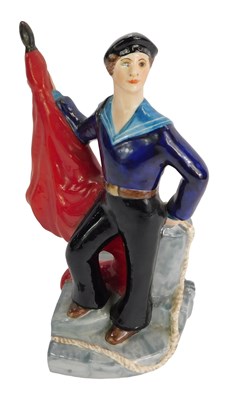 Lot 47 - A Russian porcelain figure of a Russian sailor,...