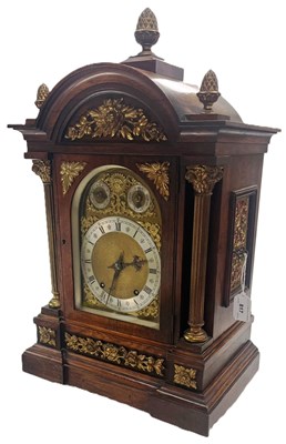 Lot 817 - A late Victorian rosewood table clock, the...