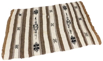 Lot 825 - A Turkish Kilim brown and cream striped rug,...