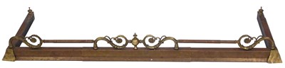 Lot 826 - A Victorian brass fender, with an urns and...
