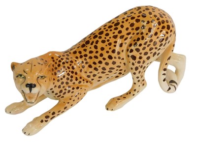 Lot 48 - A Beswick figure of a prone leopard, 12cm high,...
